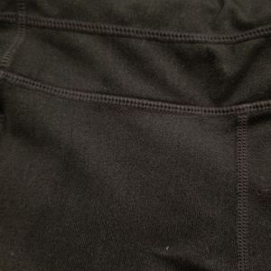 Athleta Pants - ATHLETA Black Capri Leggings with Reflective Trim Athleta Pants - ATHLETA Black Capri Leggings with Reflective Trim
